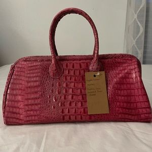 Pink Satchel From Clever Carriage Company.